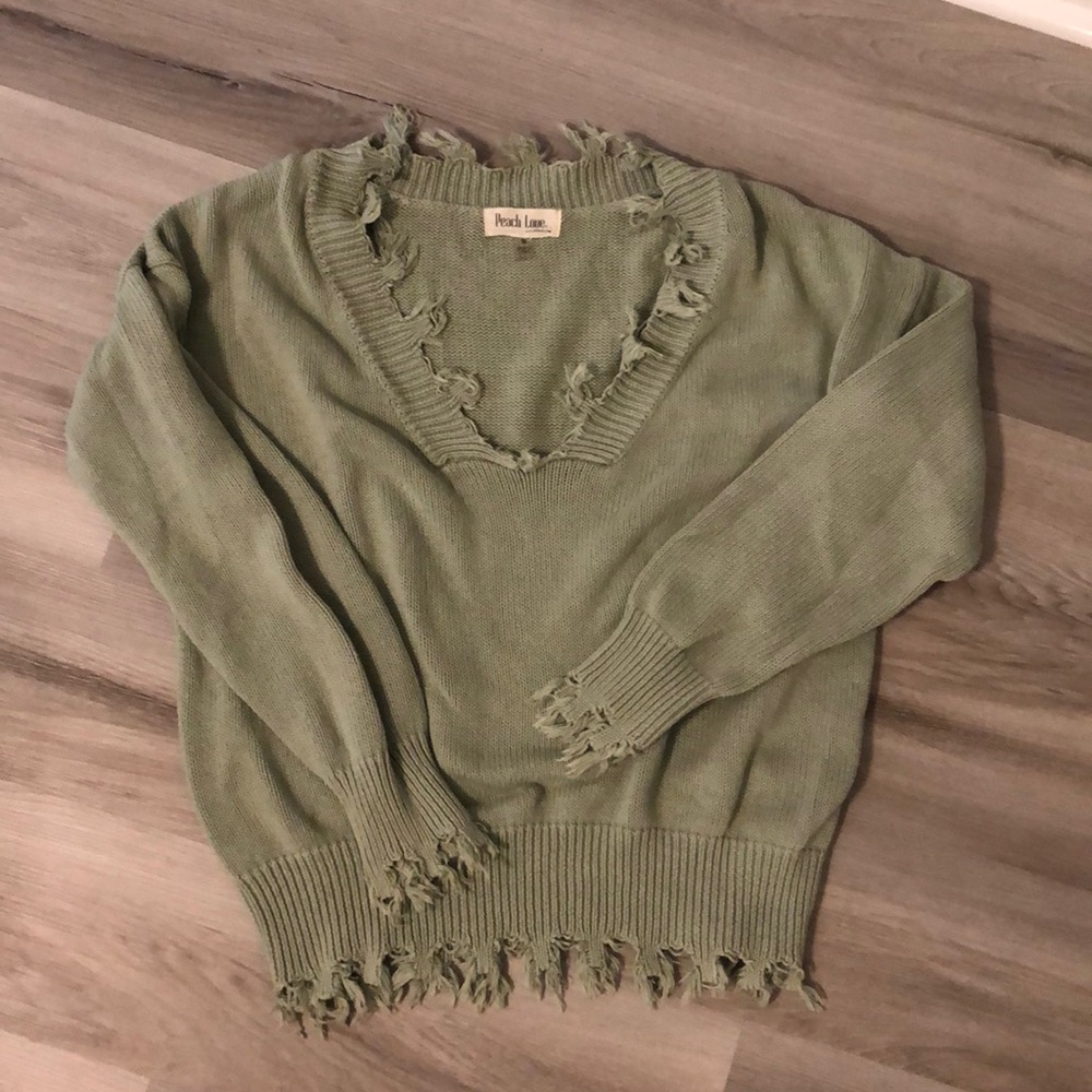 Green distressed sweater